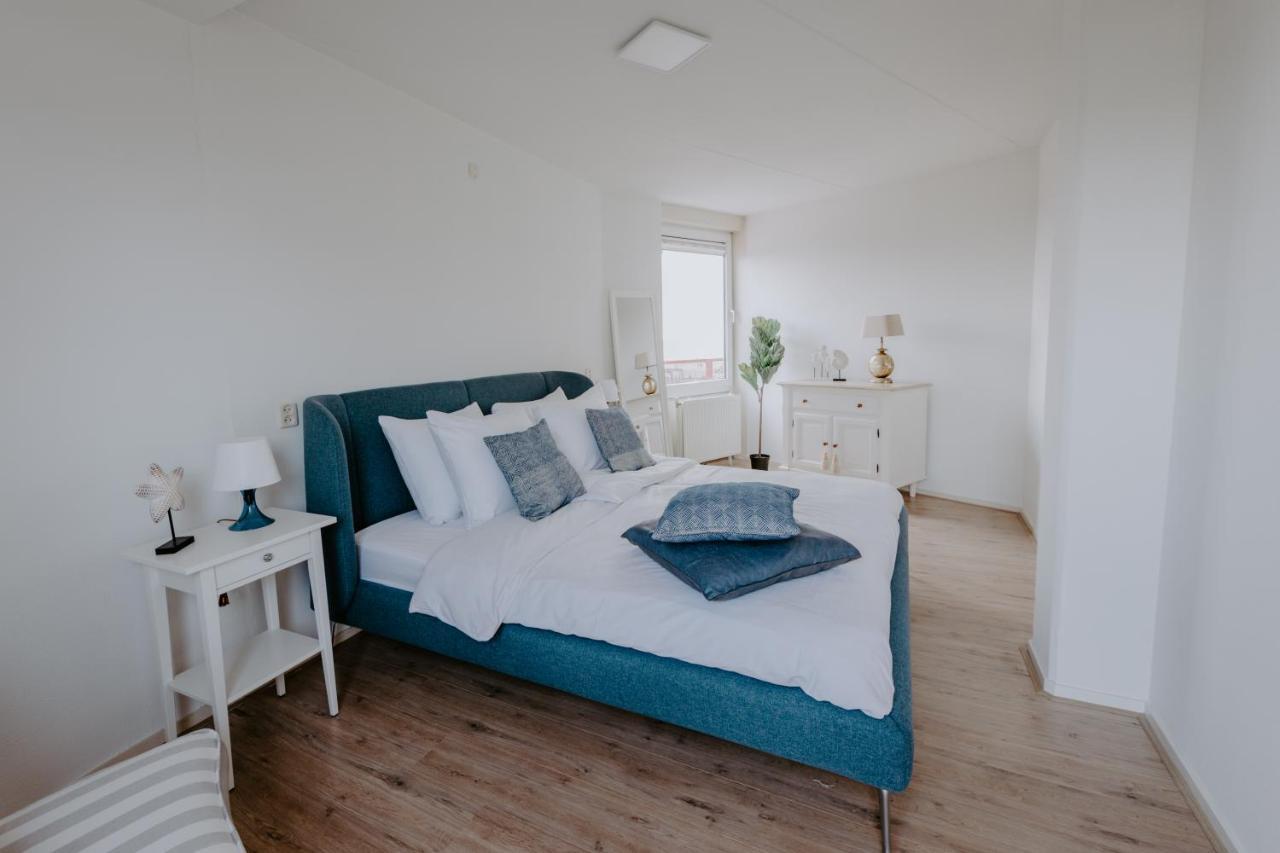Stijlvol appartement op strand Makkum Buitenkant foto